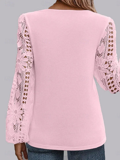Blouse élégante en dentelle pour femme, manches longues, coupe régulière, ornement asymétrique, disponible en noir, blanc et rose, idéale pour le quotidien et les vacances.